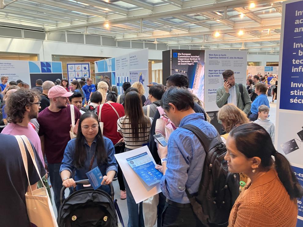 Crowd of people at the event stand about Digital Europe 