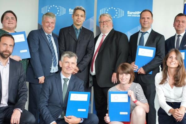 The representatives of 5 Hosting Entities, representatives from the JU and the European Commission